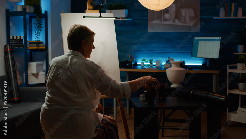 Poster old person drawing inspiration model with pencils on canvas, using artistic equipment to draw vase d
