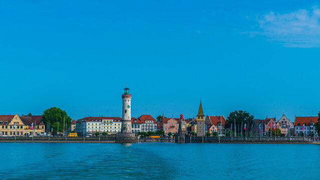 Germany, Lindau island old town port lighthouse and lion, a beautiful waterfront panorama view