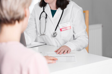 Fototapeta premium The doctor in the office is receiving patients.