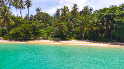 Fototapeta na wymiar Laem Ka is a small beach about 150 meters long edged by large stones. This is the only one beach in Rawai located on the leeward east coast, so there are no big waves here even in the low season. Due 