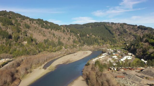 Scenic view of RV Park in Oregon by Chetco River near Brookings. Aerial drone shot.