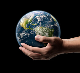earth in hands. green planet on hand. save of earth. environment concept for background web or world guardian organization. Elements of this image furnished by NASA