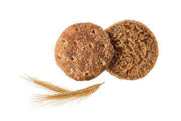 Slices of whole grain rye traditional scandinavian sandwich bread with spikelets flying isolated on...