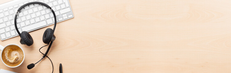 Office desk with headset and pc