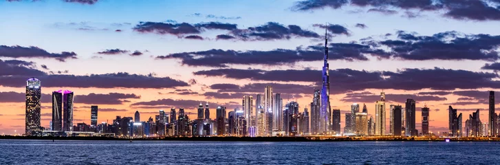 Foto op Plexiglas Wolkenkrabbershorizon van het centrum van Dubai VAE met Burj Khalifa bij zonsondergang © Photocreo Bednarek