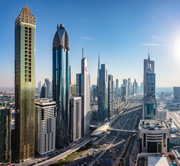 Fototapeta na wymiar Skyscrapers city highrise business buildings in downtown Dubai