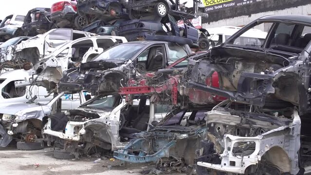 Scrapped cars, crashed cars.
Scrap cars are used for recycling and second-hand spare parts. Pile of scrap vehicles.
