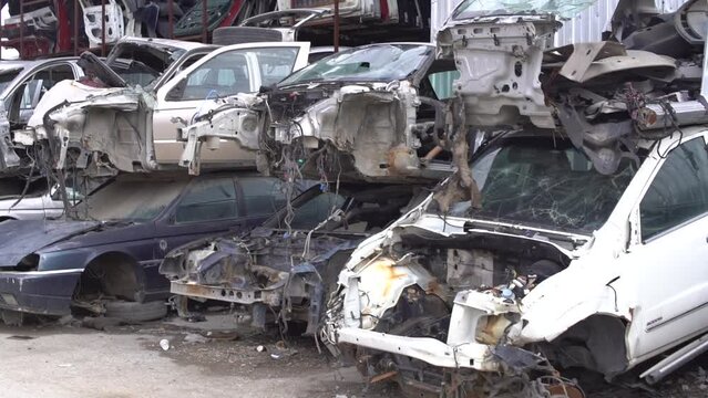 Scrapped cars, crashed cars.
Scrap cars are used for recycling and second-hand spare parts. Pile of scrap vehicles.
