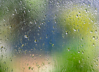 Rain drop on the glass background.
