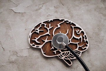 A stethoscope and brain close-up. Awareness of Alzheimer's, Parkinson's disease, dementia, stroke, seizure or mental health