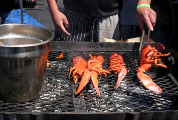 Lobster on a barbecue grill being prepared