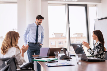 Shot of a group of business people having a meeting in a conference room