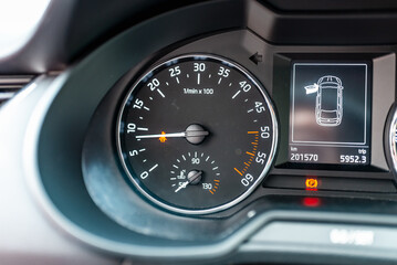 Modern car speedometer,odometer,tachometer and illuminated dashboard. car dashboard modern...