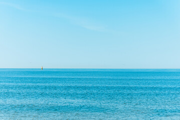 Obraz premium Beautiful morning skyline blue sky,water, sea, ocean. Calm, cool, relaxing water. cold background,copy space.