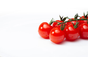 fresh tomatoes close-up on a white background