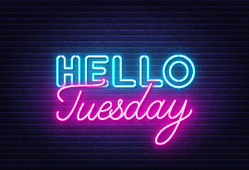Hello Tuesday sign on brick wall background.