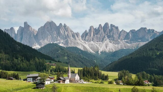 time lapse of world famous landscape of the Dolomites as seen from Val de funes in Italian alps
