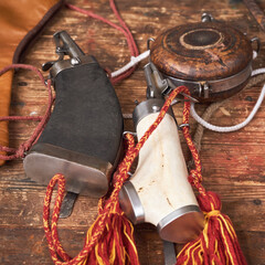 Military items for vintage guns and retro muskets - old bullets and gunpowder flask. Ancient...
