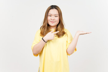 Showing and Presenting Product on Open Palm of Beautiful Asian Woman wearing yellow T-Shirt