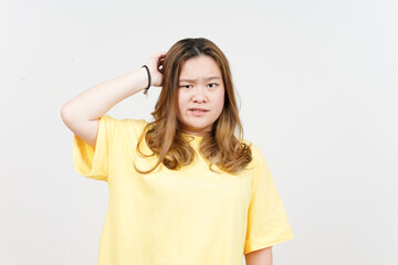 Fototapeta premium Confused gesture of Beautiful Asian Woman wearing yellow T-Shirt Isolated On White Background