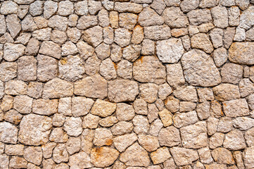Mediterrane Natursteinmauer als Textur oder Hintergrund