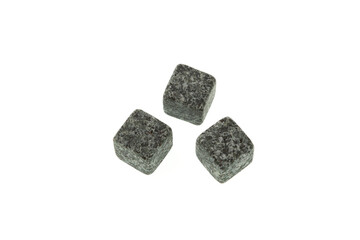 Whiskey stones isolated on white background, close-up. Design element, template. Whiskey Stones chill fine beverages without diluting them. Grey rock cubes for drinks