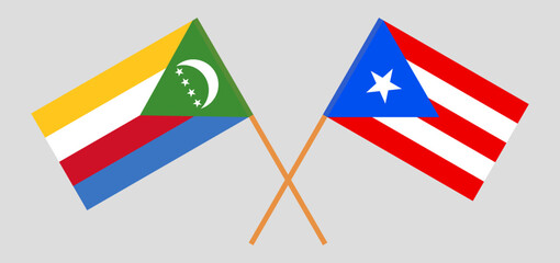 Crossed flags of the Comoros and Puerto Rico. Official colors. Correct proportion