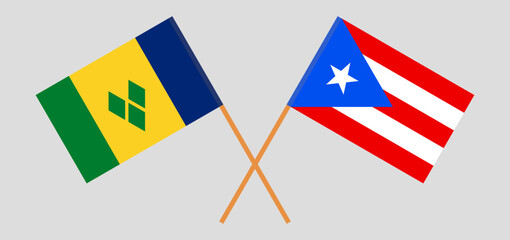 Crossed flags of Saint Vincent and the Grenadines and Puerto Rico. Official colors. Correct proportion