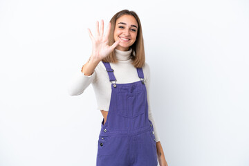 Young caucasian woman isolated on white background counting five with fingers