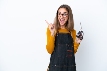 Young caucasian sewing box woman isolated on white background intending to realizes the solution while lifting a finger up