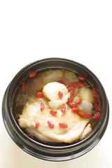 Korean food, hot pot Chinese medicine herbal wolf berry and chicken soup