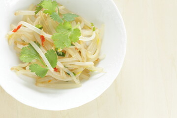 Chinese food, soy sprout stir fried served with coriander leaves