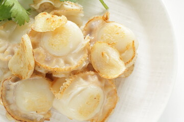 Chinese food, garlic stir fried with scallop served with coriander leaves