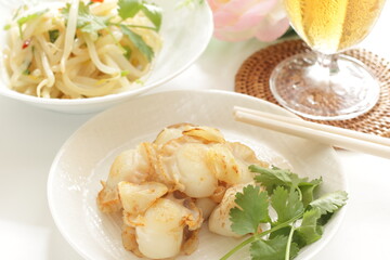 Chinese food, garlic stir fried with scallop served with coriander leaves