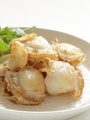 Chinese food, garlic stir fried with scallop served with coriander leaves