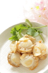 Chinese food, garlic stir fried with scallop served with coriander leaves