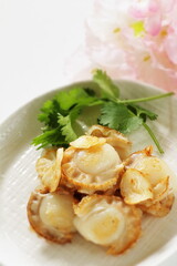 Chinese food, garlic stir fried with scallop served with coriander leaves