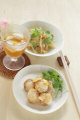 Asian food, scallop and garlic stir fried served with soy sprout