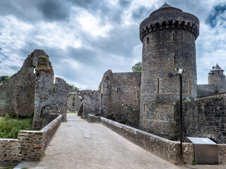 Fototapeta na wymiar Fougeres, France July 2022. Medieval castle at Fougeres gate of Kingdom region in France, dramatic sky