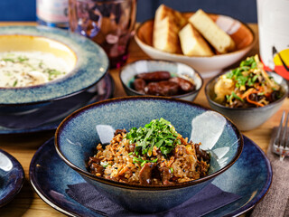 Set of assorted pan asian dishes. Chinese, Korean, Japanese cuisine. Soups, dumplings, noodles, rice and desserts.
