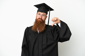 Young university graduate reddish man isolated on white background showing thumb down with negative expression