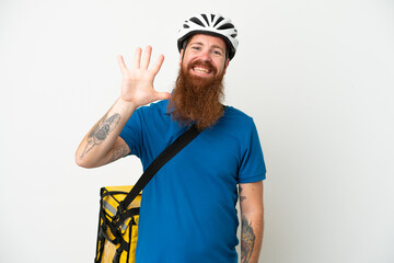 Young reddish caucasian man with thermal backpack isolate don white background counting five with fingers