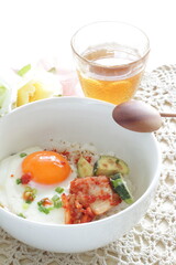 Korean food, deep fried zucchini and Kimchi with sunny side up fried egg on rice