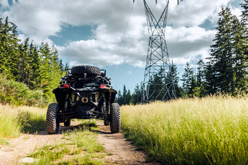 UTV in the woods dirty from mud