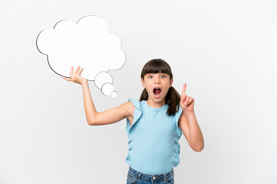 Little caucasian kid isolated on white background holding a thinking speech bubble