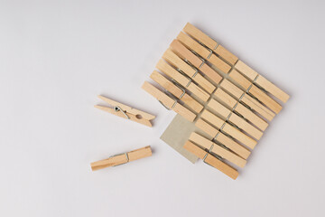 set of wooden clothespins isolated on white background