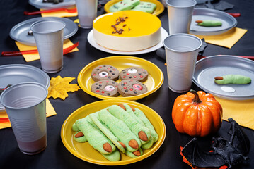 Halloween sweet appetizer kids table setting concept