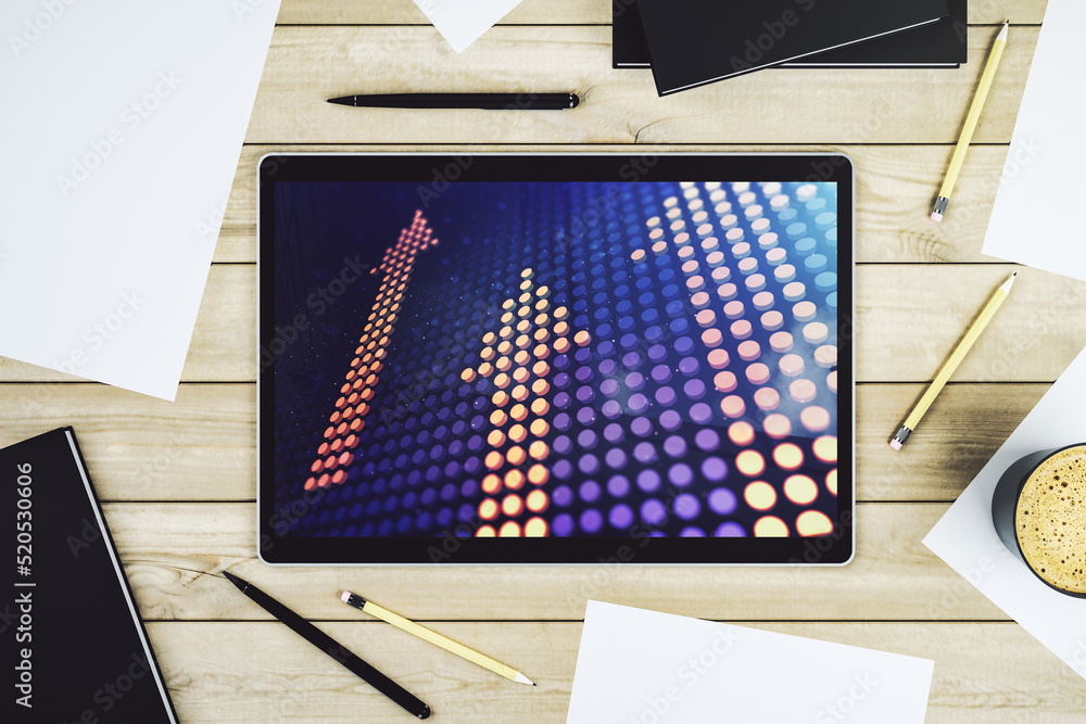 Poster top view of modern digital tablet monitor with creative abstract upward arrows hologram. ambition an