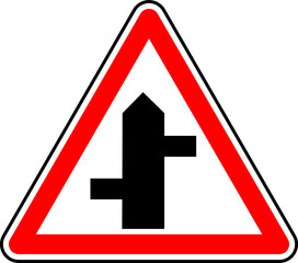 Vector graphic of a uk staggered junction ahead road sign. It consists of a depiction of the road layout contained within a red triangle