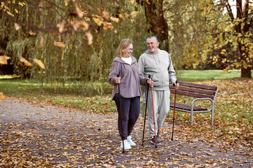 Fototapeta premium Senior caucasian couple hiking together at the park
